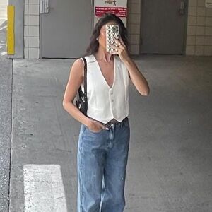 White Sleeveless Button-Up Vest